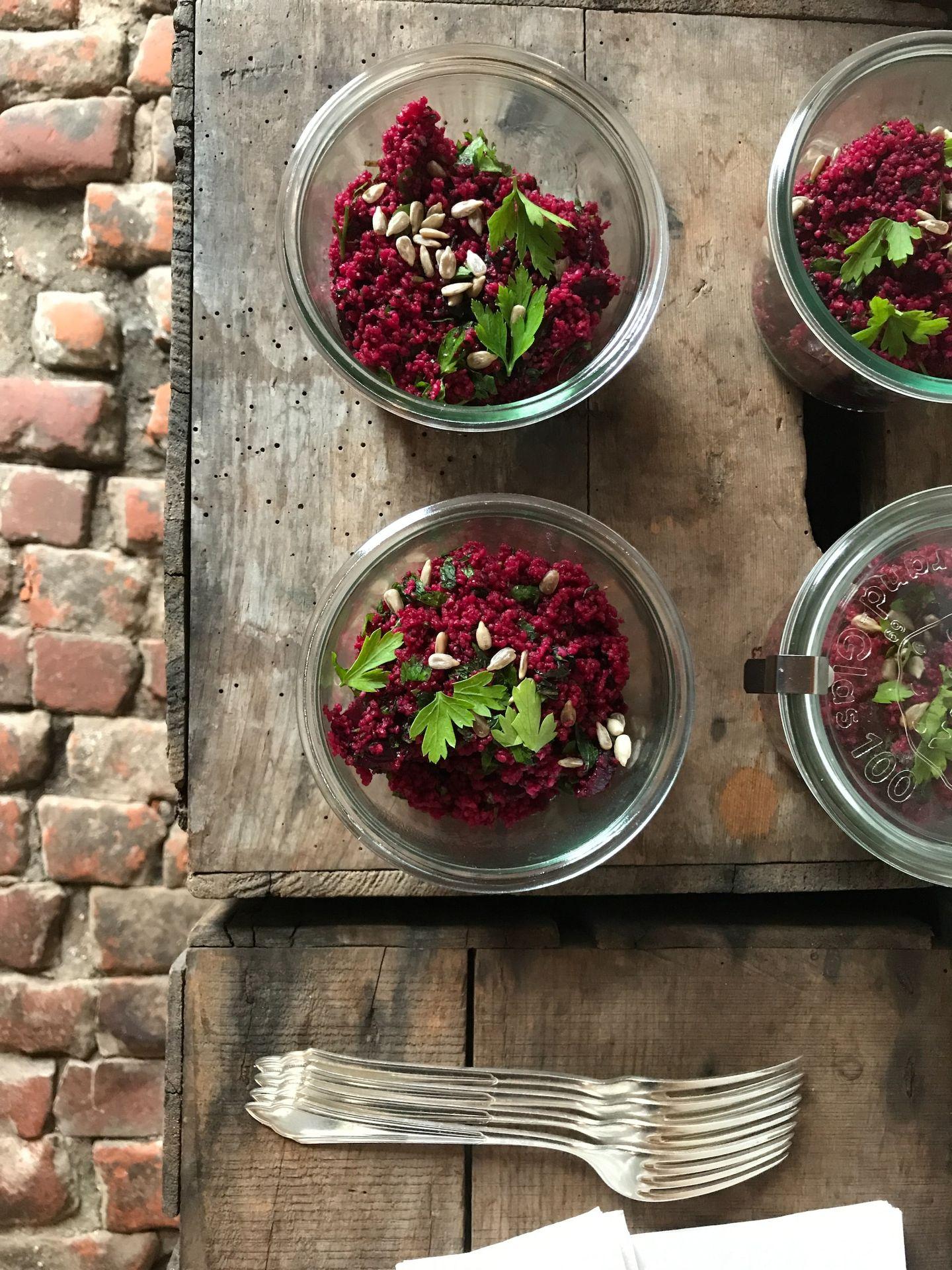 red and green leaves in clear plastic containers