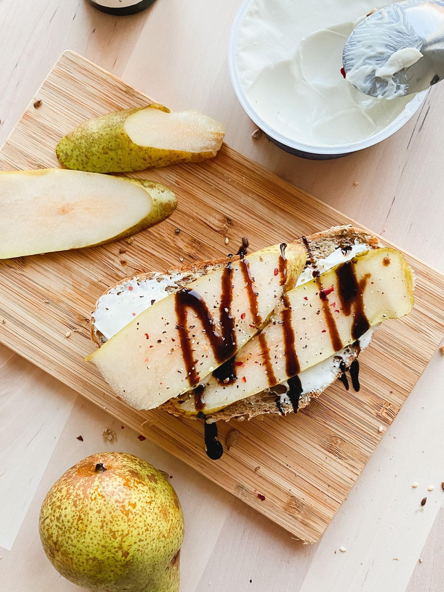 sliced bread on brown wooden chopping board