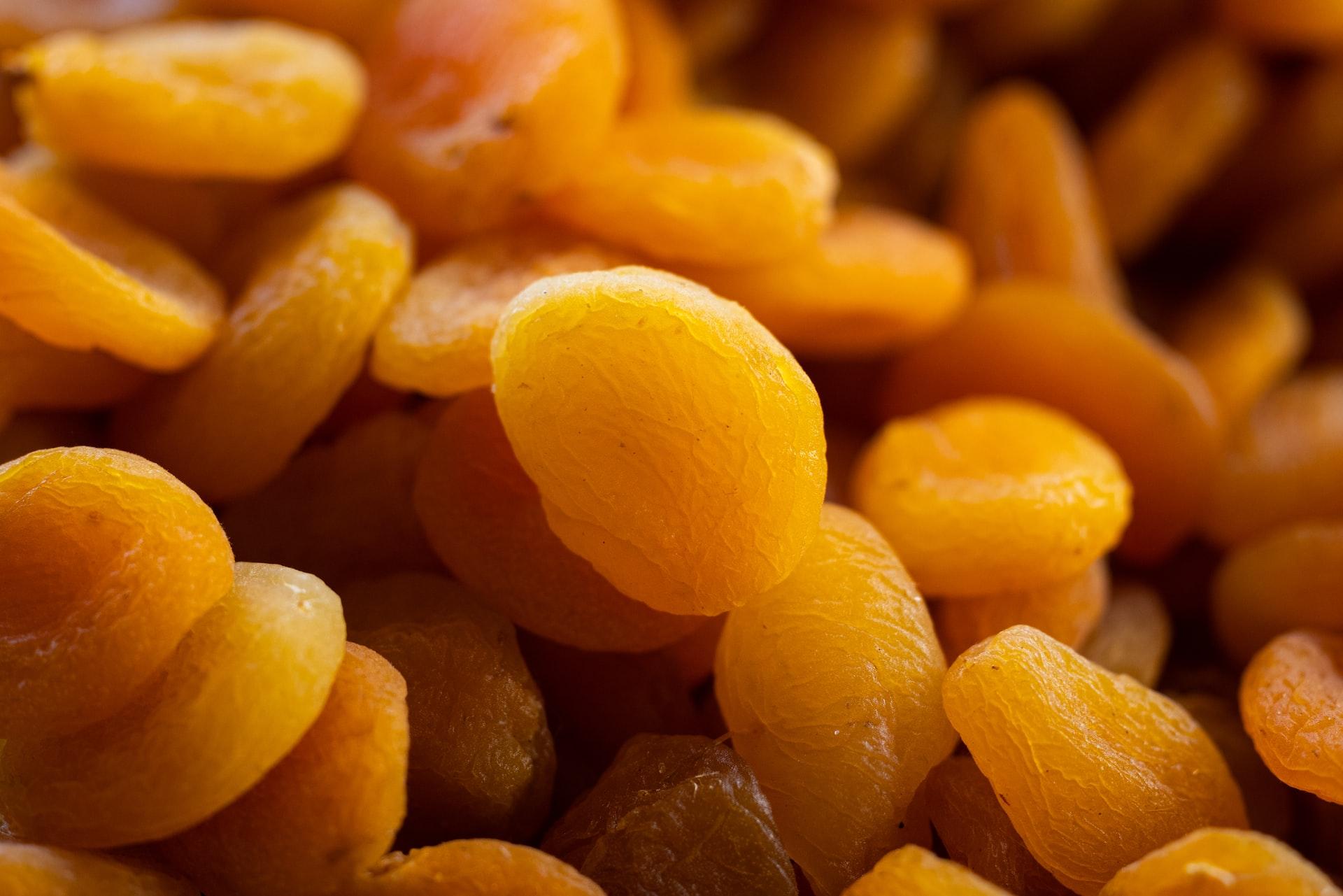 a close up of a pile of peeled oranges
